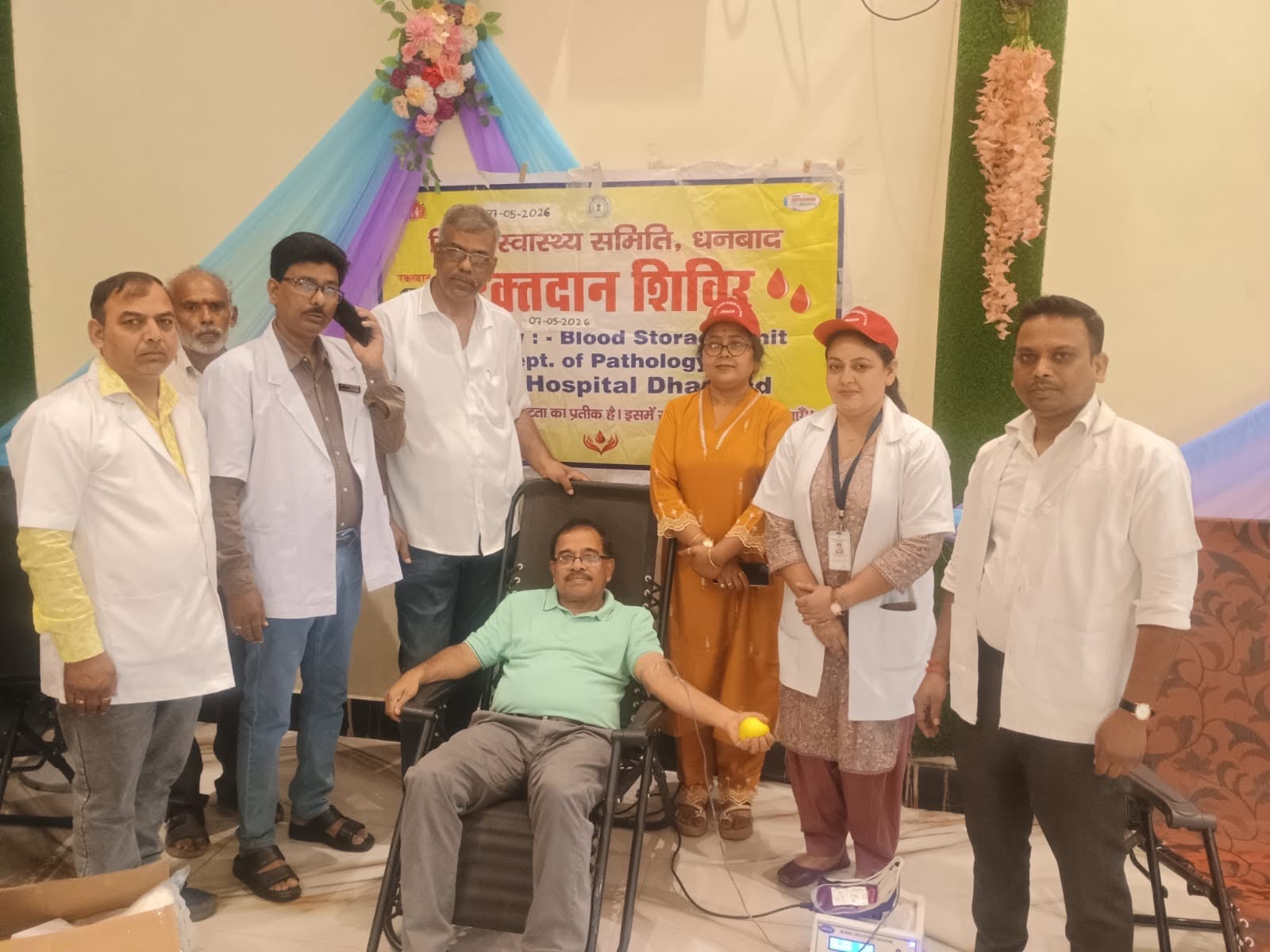 Medical team and organisers standing together at the camp